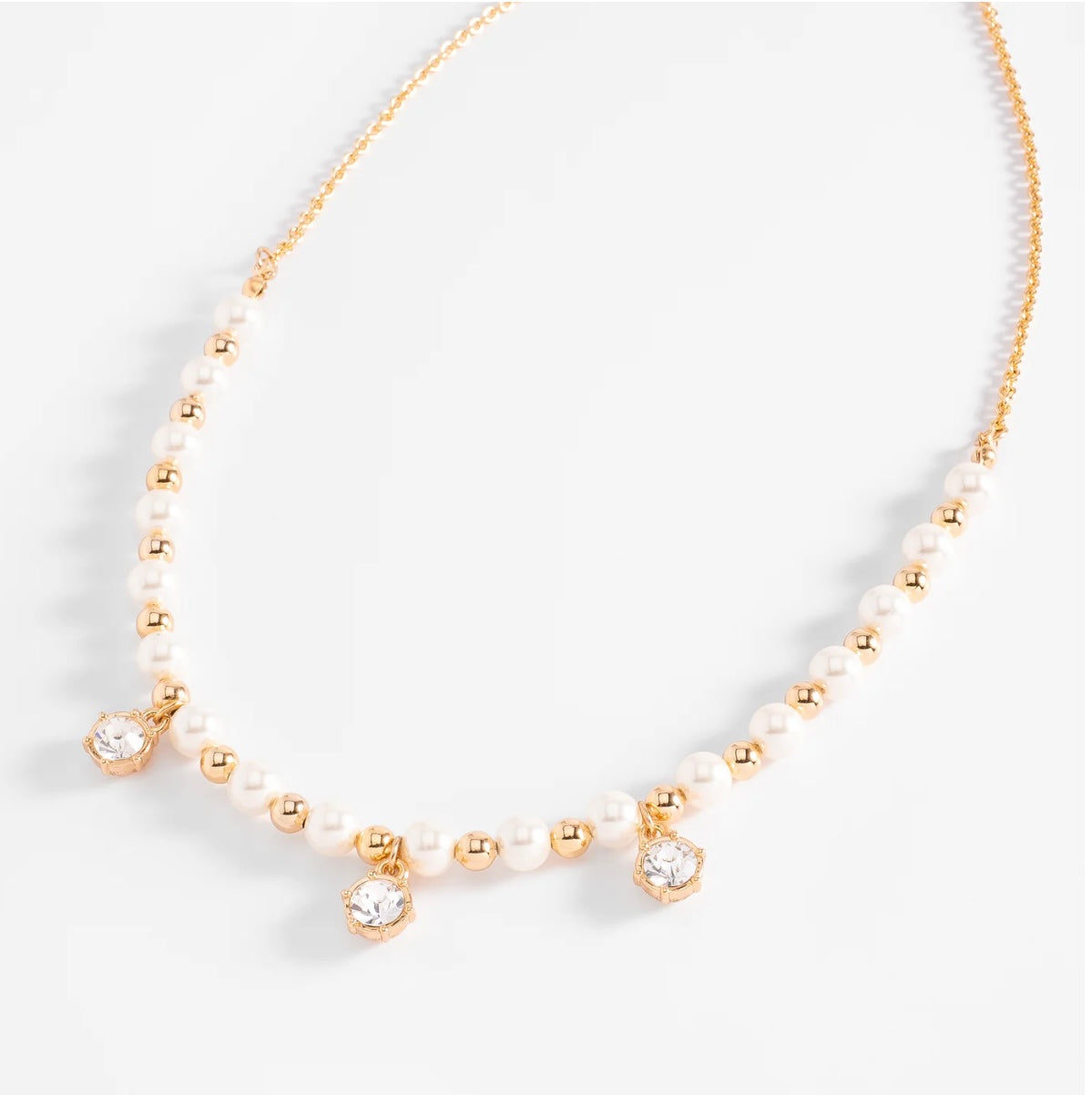 Elegant Pearl & Gold Charm Necklace