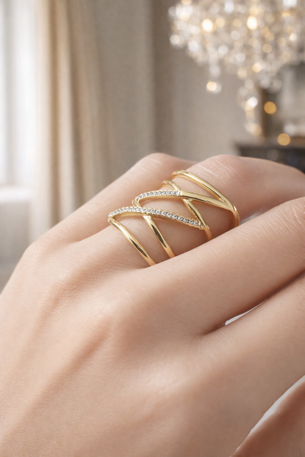 Elegant Criss-Cross Gold Ring with Sparkling Detail